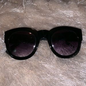 Black thick framed sunglasses